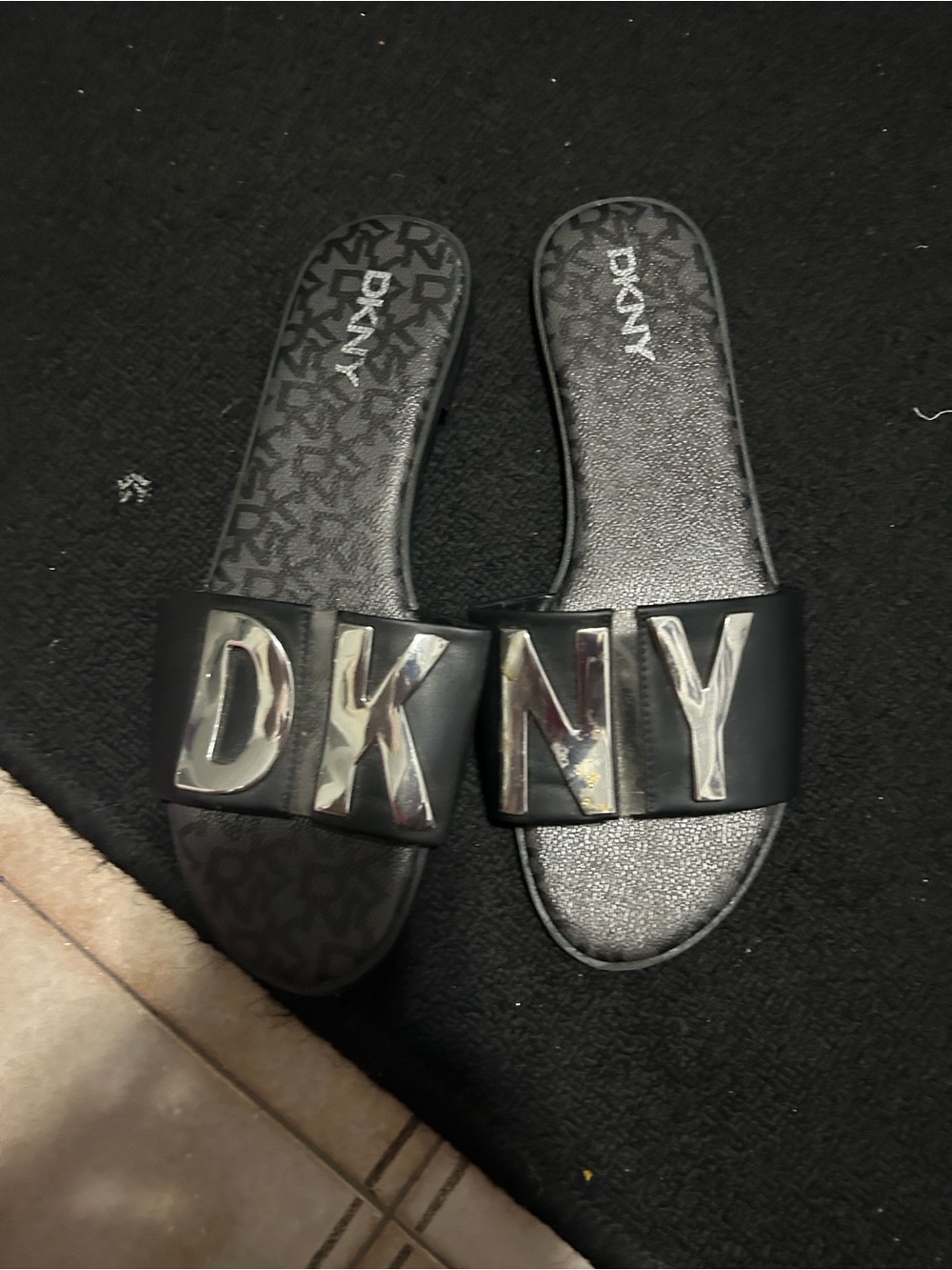 DKNY Black Slide Sandals with Silver Logo Plaques